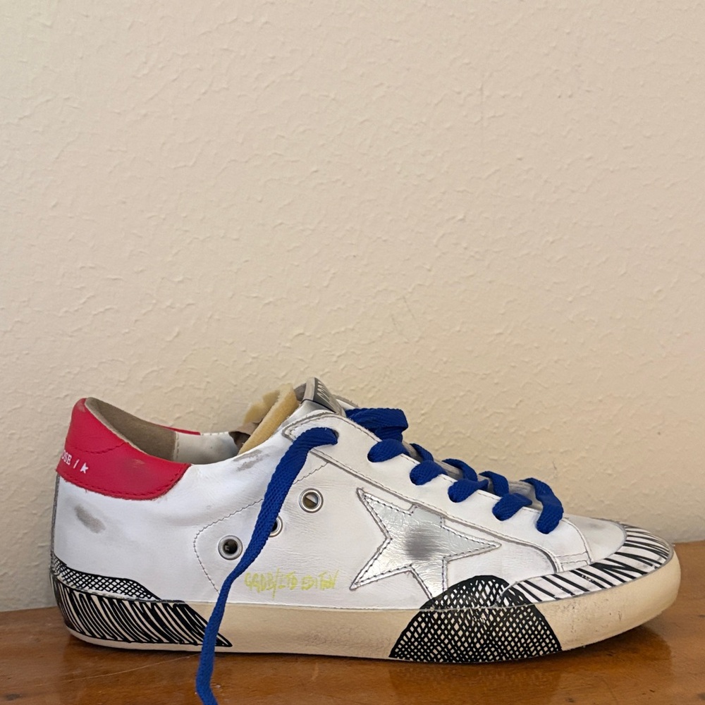 LIMITED EDITION Golden Goose Silver and red superstars. Extremely good condition